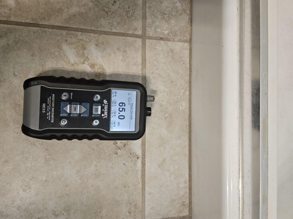 Moisture meter in use